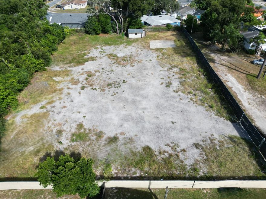 GREAT OPPORTUNITY!! Owner Financing Available! Vacant Land – 0.78 Acres. Looking for space to spread out, work on your projects, or store your toys? This unique property is perfect for those who love to tinker and need secure, private space — without HOA restrictions breathing down your neck! Perfect for: Mobile home, tiny home, or site-built residence. Property Highlights: Zoned AR with county non-conformity exception (salvage yard use permitted.) On-site well with a new pump in (2023) located within a Pump house /storage building with new roof in (2023) Electricity hookup also available. Fully fenced: 8’ chain-link fence with 20’ rolling gate at front entrance, 6’ fencing on remaining sides – all with privacy screening (new in 2022) Concrete work pad (approx. 30’x 30’) Quiet, private dead-end road, yet close to shopping, restaurants and entertainment. Call today for more information. Seller open to reasonable offers!