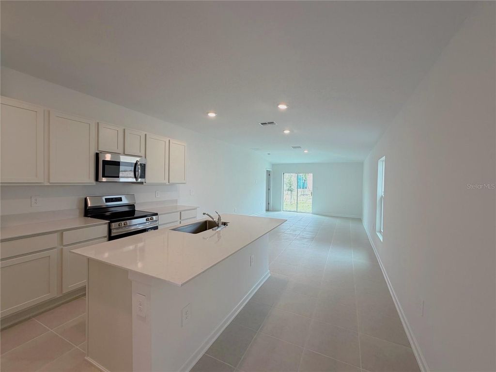 Photo of 2154 Lasso Loop, Eagle Lake, FL 33839 (MLS # O6369279)