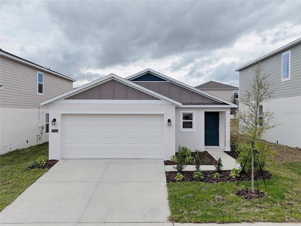 Photo of 2154 Lasso Loop, Eagle Lake, FL 33839 (MLS # O6369279)