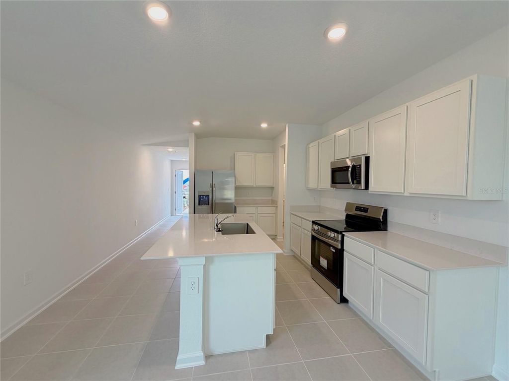 Photo of 2154 Lasso Loop, Eagle Lake, FL 33839 (MLS # O6369279)