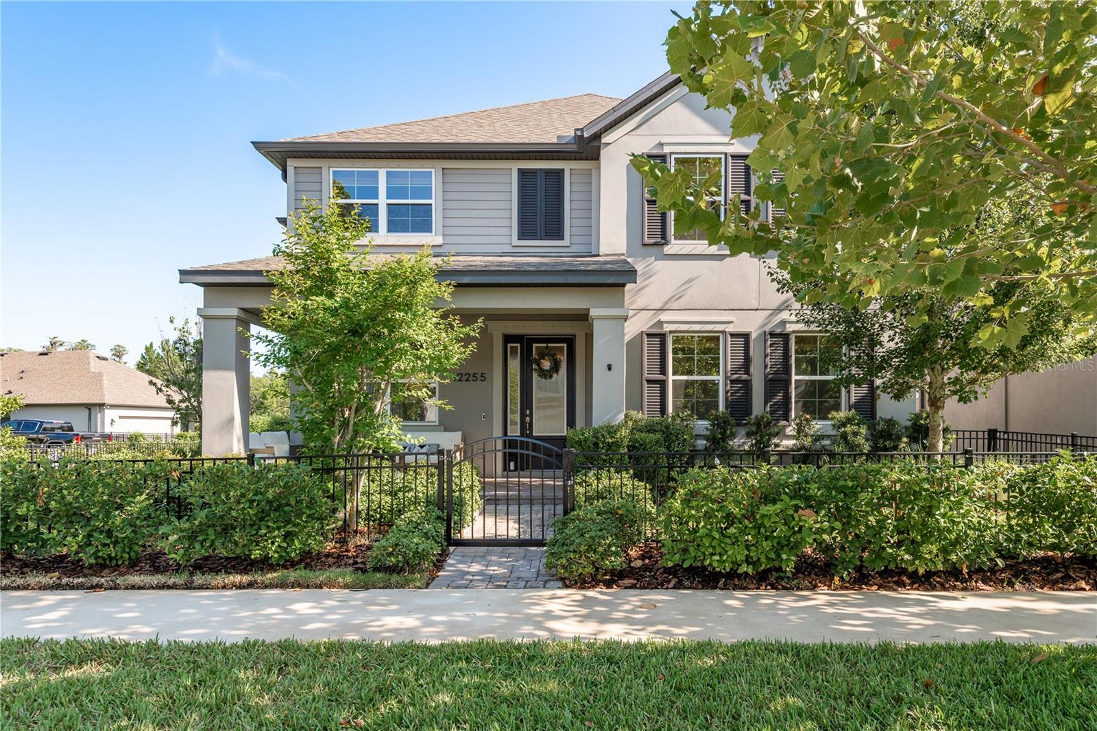 This stunning 5-bedroom, 3-bathroom Rochester model by MI Homes offers 3,333 sqft of beautifully upgraded living space in the award-winning master-planned community of Starkey Ranch. From the moment you step inside, you’re met with a formal dining room to the left and a guest bedroom with a full bath to the right—perfect for guests or a private office. The heart of the home opens into a spacious, light-filled living area centered around a chef’s kitchen featuring quartz countertops, a 36” gas range, double oven, glass cabinet uppers, a large center island, and a pantry closet. Just off the kitchen is a fully upgraded laundry room with upper and lower cabinetry, butcher block counters, and an apron sink, which connects directly to the 2-car garage equipped with hanging ceiling storage and an electric vehicle charger. The open-concept living room includes a custom-built-in dog alcove and offers plenty of space to relax or entertain. Upstairs, a massive game room provides endless possibilities—use it as a home theater, pool table area, or fitness studio. The primary suite is tucked away for privacy and features a spacious walk-in closet and a luxurious bathroom with a walk-in shower and new touchscreen lighted mirrors, while three additional bedrooms and a full bath sit on the opposite side of the second floor. Brand-new luxury vinyl plank flooring runs throughout the second level, and the entire home has been freshly painted inside. Sitting on a large, fully fenced lot with upgraded landscaping in the front, back, and side yards, this property stands out as the only home in the community with an exclusive full front-to-back fence—an extremely rare feature in Starkey Ranch. The backyard also includes a private outdoor shower, ideal after enjoying the nearby nature trails. Additional highlights include a Ring security system and smart, stylish finishes throughout. Living in Starkey Ranch means access to top-rated schools, including an on-site K–8, as well as three resort-style pools, tennis courts, playgrounds, and miles of trails. Move-in ready and thoughtfully upgraded, this home offers space, function, and lifestyle all in one of Tampa Bay’s most desirable neighborhoods.