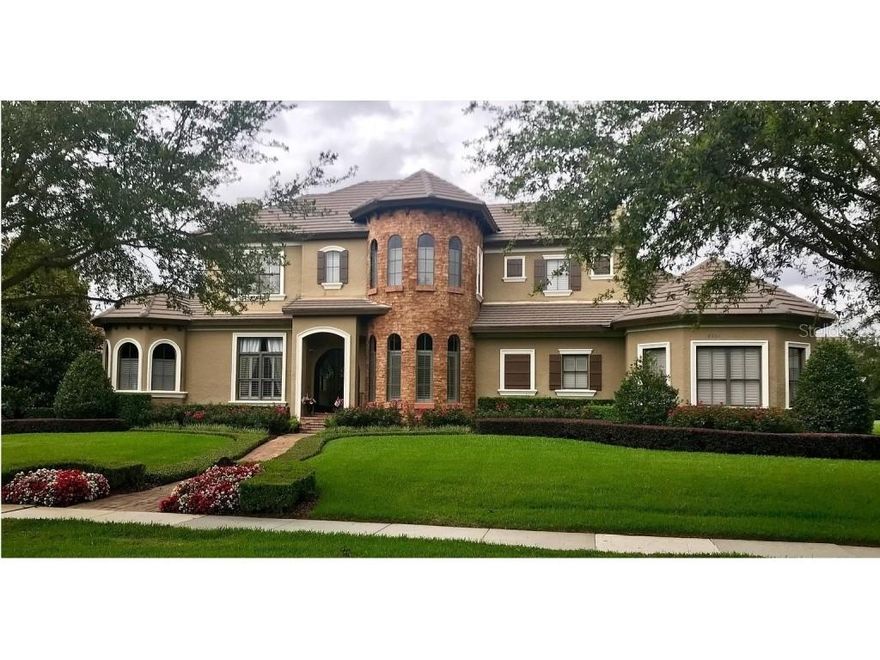 Stunning Keene's Pointe home! Everything you are looking for in a custom home. Built by Stonebridge, this home has plenty of space for everyone and everything. The first floor boasts beautiful travertine and hardwood flooring throughout the formal living room with gas fireplace, dining room with adjoining dry bar and office with book niche. The private master suite has a separate Glam Room, large walk-in closet and luxurious master bath with large glass shower and dual vanities. Also on the first floor is two additional bedrooms with shared bath, additional flex room that could be a sixth bedroom or second office/hobby room, laundry room, mud room, and even a place for the pets under the staircase! The kitchen offers high-end stainless steel appliances and custom cabinetry and overlooks the breakfast and family rooms. The family room has a custom-built entertainment center and large sliding glass doors that open up to the updated lanai with wood-paneled ceiling and travertine decking. Next to the family room is the spacious media room with wet bar and half bath. The second floor offers two ensuite bedrooms and two areas that include a built-in desk and sitting area. A summer kitchen and swimming pool with updated spa with rock accent overlooks the spacious back yard. There is also a 3-car garage separated into 2 spaces. This home has custom drapes and shutters, numerous built-ins, detailed moldings and woodwork, and many more upgrades. Meticulously maintained including all new HVAC, new exterior paint, gas pool heater, irrigation well pump, and more!