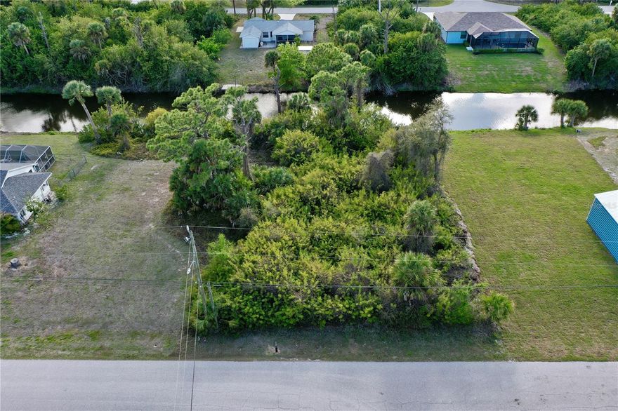 Don't miss your opportunity to purchase this great canal property for sale in Port Charlotte! Featuring 80ft of water frontage, this lot measures 80x125 (10,000sqf or .23 acres) and is conveniently located just down the street from HWY 776. Public Water is available and a septic system would be needed. CCGIS map shows this property IS NOT located in a Scrub Jay Mitigation Zone, and National Wetland Inventory map shows NO WETLANDS on the property. For easy traveling North and South through the state, you are about 15 minutes from US41 and 30 minutes from I75. This property is situated close to Englewood and Rotonda West, with Englewood and Boca Grande Beaches only a short drive away. In fact, you are located within 15 minutes of some of the area's best beaches! The location is also very close to many shopping malls (including the Port Charlotte Town Center), great restaurants, and the Charlotte County Sports Park, which hosts the Tampa Bay Rays during Spring Training. For all the golfers out there, there are enough golf courses nearby to play a different one every day of the week! Don't miss your opportunity to build your dream home on this property today!