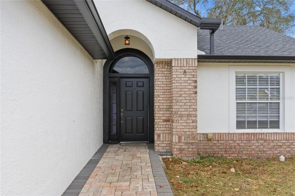 Photo of 628 Valencia Place Circle, Orlando, FL 32825 (MLS # O6384441)