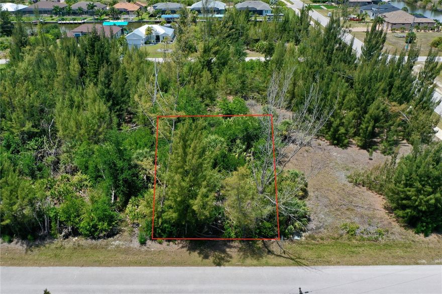 Tucked away in the premier deed-restricted community of South Gulf Cove, this exceptional 10,000-square-foot (.23-acre) residential lot at 8409 Antwerp Circle offers a perfect canvas for your Florida dream home. The property features standard dimensions of 80x125 feet with 80 feet of road frontage and is conveniently located on public water and sewer. According to the Charlotte County Permit Boundary, this lot is not located in a Scrub Jay review area, simplifying the building process for any future owner. For those seeking even more space and privacy, the adjacent property at 8401 Antwerp Circle is also available for sale separately, providing a rare opportunity to acquire a double lot. South Gulf Cove is a rapidly growing community that manages to maintain a sense of seclusion and privacy while remaining close to the area's top restaurants, shopping centers, and several championship golf courses, all located within a short drive.

Residents enjoy an unparalleled outdoor lifestyle with access to a community boat ramp, San Domingo Park located right down the street, and a growing network of sidewalks perfect for scenic walks through the neighborhood. The property is ideally positioned for beach lovers, with the pristine sands of Boca Grande and Englewood Beach just minutes away, offering some of the most beautiful sunsets in the state. Sports enthusiasts will appreciate being approximately 15 to 20 minutes from Charlotte Sports Park, the spring training home of the Tampa Bay Rays. This location also provides excellent connectivity for commuters or travelers, sitting just 30 minutes from I-75 for easy access north and south throughout Florida. Don’t miss this incredible opportunity to secure your piece of paradise and build the lifestyle you desire and deserve today!
