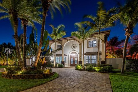 Photo of 10127 Paradise Boulevard, Treasure Island, FL 33706 (MLS # TB8490499)