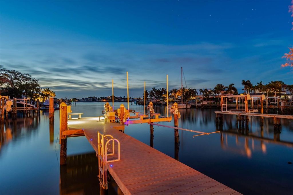 Photo of 10127 Paradise Boulevard, Treasure Island, FL 33706 (MLS # TB8490499)