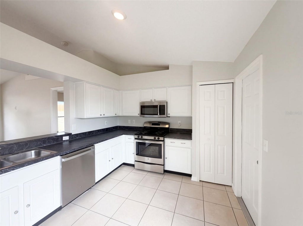 Photo of 13319 Caspian Lane, Clermont, FL 34711 (MLS # O6446890)
