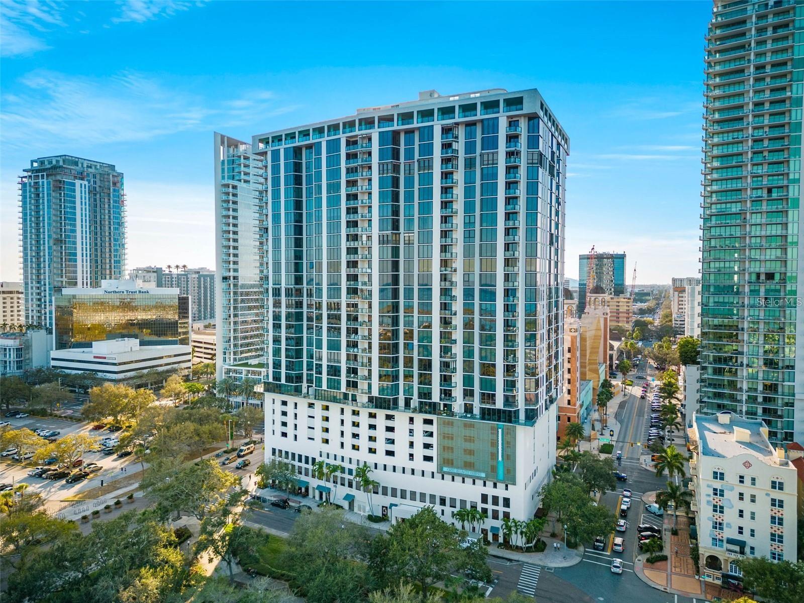 What a steal! Here is your opportunity for sweat equity in this pristine solid block/concrete condo building located on Beach Drive in Downtown St Petersburg. Features include recently updated kitchen, generous master suite with walk in closet and a full master bathroom, laundry room (was 1/2 bathroom and can be converted back into a 1/2 bath), a large great room overlooking the breathtaking views of DT St Pete, and all its entertainment, dining, art, and boating you could ask for. There is also a nice sized dining area and a balcony. Bayfront Towers delivers with its upscale amenities. Residents enjoy the valet parking, round-the-clock security, and exclusive access to the entire 28th floor + 29th floor, which include club rooms, a library, a bar, and a fitness center. The rooftop boasts a heated pool, barbecue areas, and a jogging path, offering THE ULTIMATE downtown living experience. A quick walk to all of the incredible restaurants, bars, & entertainment that makes St. Pete world class, don't forget the exciting Saturday Morning Market across the street that offers fresh food from October thru May.