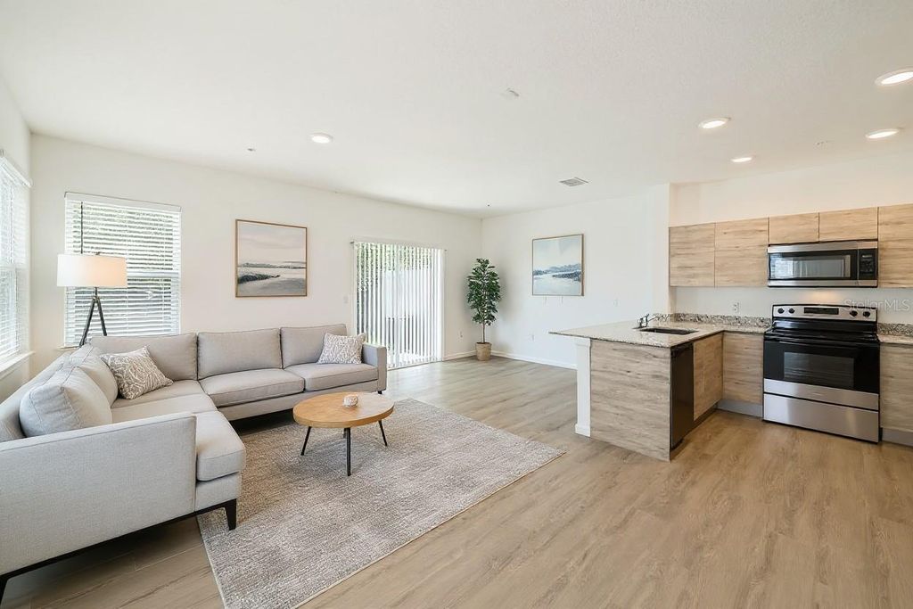 Photo of 1213 Southstation Place #404, Orlando, FL 32809 (MLS # O6354707)