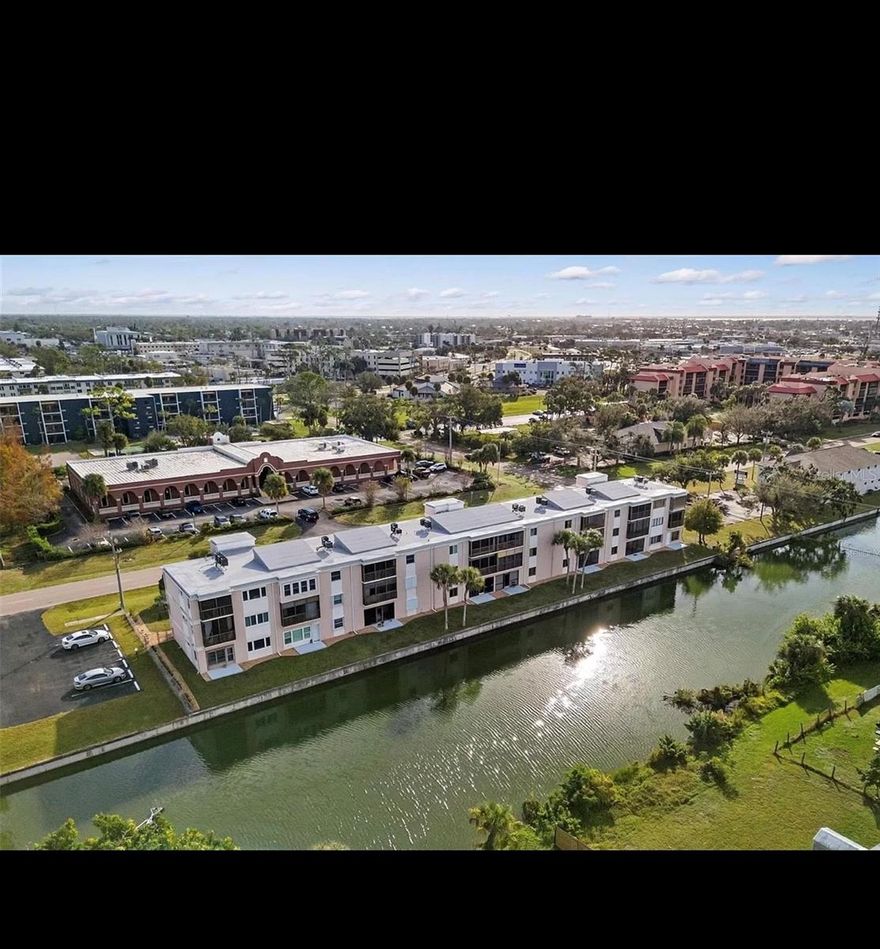 Discover Your Dream Home at Sunrise Towers – A Rare Canal-View Gem That Feels Like a Private Townhome!
Welcome to this stunning  condo in highly desirable Sunrise Towers, perfectly positioned with breathtaking canal views and unbeatable central location. Bathed in natural light and designed for effortless living, this bright, airy residence offers the spacious feel of a townhome with the convenience of condo ownership—including dual entrances (first and second floors) and prime proximity to the elevator for seamless access.
Main Level Highlights: Open, inviting living area perfect for relaxing or entertaining, Charming kitchen featuring sleek granite countertops, elegant cabinetry, and a cozy dining nook, Convenient powder room, Expansive screened lanai overlooking the serene canal—your private outdoor oasis. Two oversized bedrooms. Generous closet space in both bedrooms for effortless organization. Private screened balcony with peaceful canal vistas, ideal for morning coffee or evening sunsets. Thoughtful extras abound: ample built-in storage throughout, plus a dedicated private exterior storage unit perfect for bikes, beach gear, kayaks, or seasonal items. Community Perks: HOA covers water, sewer and  trash, Pets welcome, Assigned covered parking (recently resealed lot), Elevator access and low-maintenance lifestyle. Nestled in the heart of it all—minutes from top doctors and hospitals, grocery stores, restaurants, charming Historic Downtown Punta Gorda,  and endless Southwest Florida adventures. This exceptional,  condo won't last long—it's priced to sell and ready for you to move right in. Schedule your private tour today and experience the lifestyle you've been dreaming of!