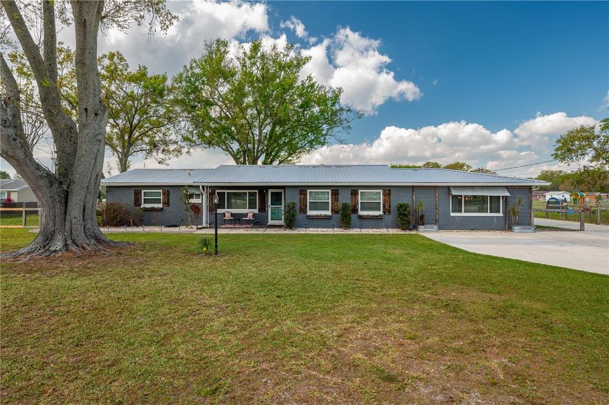 This updated 4 Bedroom/2 Bathroom home on 1.33 acres has it all! If a beautiful and well maintained home on a large expansive lot is what you are after.. look no further because this has everything you want/need and so much more. Light and bright kitchen and dining space boasts granite countertops, large kitchen island, stainless steel appliances and huge walk in pantry. Separate living and family rooms allow for the family to spread out and gives a range of possibilities. Master bedroom and ensuite like much of the home bring in the farmhouse charm and is the perfect place to unwind after a long day. Location location location. This home is in the highly sought after Berkley Charter School district-only a 3 minute drive and close to I4 for a quick hop to Lakeland, Orlando, Tampa or either coastline. All located on 1.33 acres of fully fenced in mature landscaped yard.  This yard was built for family fun and entertaining. So many amazing memories will be made here. 24’’ above ground pool, paver patio area and entertainment space, huge commercial playground equipment and gazebo just to name a few. Bring the RV, boat and whatever toys you have because you have plenty of space to store it all! 31x24 foot workshop with 2 garage doors along with 2 carports and 2 additional storage sheds await you. This home is a must see property! Schedule a private tour today.