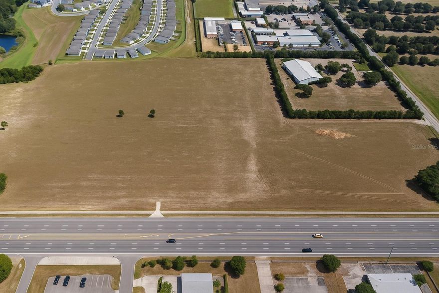 43-Acre Prime Development Opportunity – Mount Dora’s Wolf Branch Innovation District

Seize a rare chance to develop 43 acres of buildable land in the heart of Mount Dora’s high-growth Wolf Branch Innovation District. This offering includes 21445 State Road 46 plus an adjoining parcel to the west, creating a unified and strategically located investment with unmatched development potential.

Positioned directly on SR 46, this site offers exceptional visibility and accessibility—just minutes from US-441, the 429 Expressway, and the future Wekiva Parkway. It sits fully within Mount Dora city limits and is surrounded by city-approved developments and infrastructure investments.

Investment Highlights:
 • 43 contiguous acres of buildable land (with adjacent western lot included)
 • Within the Wolf Branch Innovation District—Mount Dora’s forward-looking growth corridor
 • Surrounded by approved development projects (included in listing package)
 • Ideal for mixed-use, commercial, residential, or institutional development
 • Key road frontage on SR 46 and immediate access to regional highways
 • Minutes from Historic Downtown Mount Dora and major planned retail/medical projects

Included in This Offering:
 • City planning documents outlining the vision and strategic development intent
 • Approved site plans for neighboring parcels—proving local development momentum
 • High-quality photos, maps, and renderings for due diligence and investor presentations

This is one of the largest available development tracts in the Innovation District, offering flexibility, scale, and strong municipal backing.

Inquiries and offers now being accepted. Mount Dora is growing—be part of what’s next.