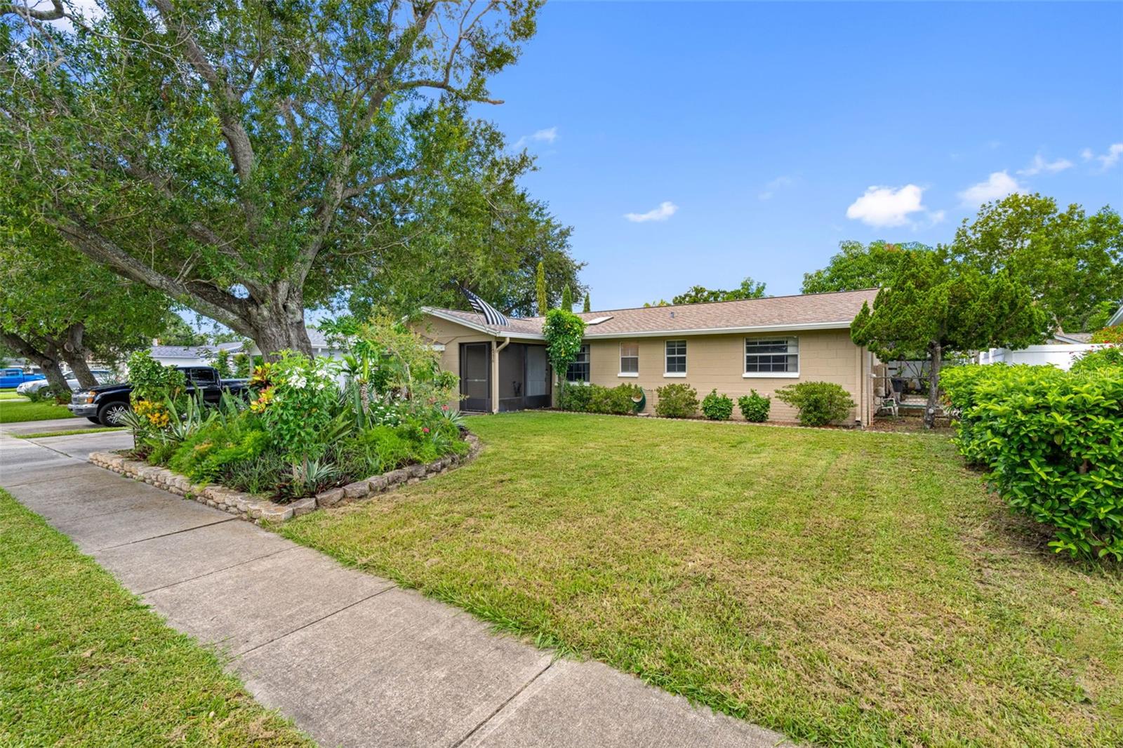 Charming Clearwater Home with Modern Updates and a Tranquil Backyard Oasis!
Discover this well-maintained, 3-bedroom, 2-bathroom home, owned by the same owner for 35 years, in Clearwater — offering the perfect blend of comfort, functionality, and serene outdoor living. A brand-new roof (July 2025), freshly painted interior and recently thoroughly cleaned carpet provide a move-in-ready experience with lasting value.
The flexible floor plan features two inviting living areas—one highlighted by a cozy fireplace, the other enhanced by a skylight that fills the space with natural light. A converted garage by previous owner offers additional versatile living space with a washer and dryer, ideal for a home office, hobby room, or guest retreat.
The primary and guest baths are designed for practicality, including an accessible bathtub and shower for added convenience. Step outside to a screened porch overlooking a fully fenced backyard designed for relaxation and entertainment, complete with vibrant tropical landscaping, orchids, fruit-bearing mango trees, and two storage sheds for organization and tools.
Located just minutes from Clearwater’s pristine beaches, shopping, dining, and top-rated schools, this home presents a rare opportunity to enjoy the Florida lifestyle in a well-established neighborhood. A recent 4-point inspection (July 2025) with no issues transfers to the buyer for extra peace of mind.
Schedule your private showing today and experience the charm and possibilities this Clearwater property offers.