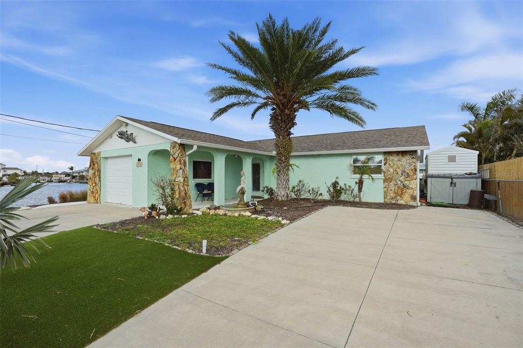 Photo of 13822 Malcolm Avenue, Hudson, FL 34667 (MLS # W7885254)