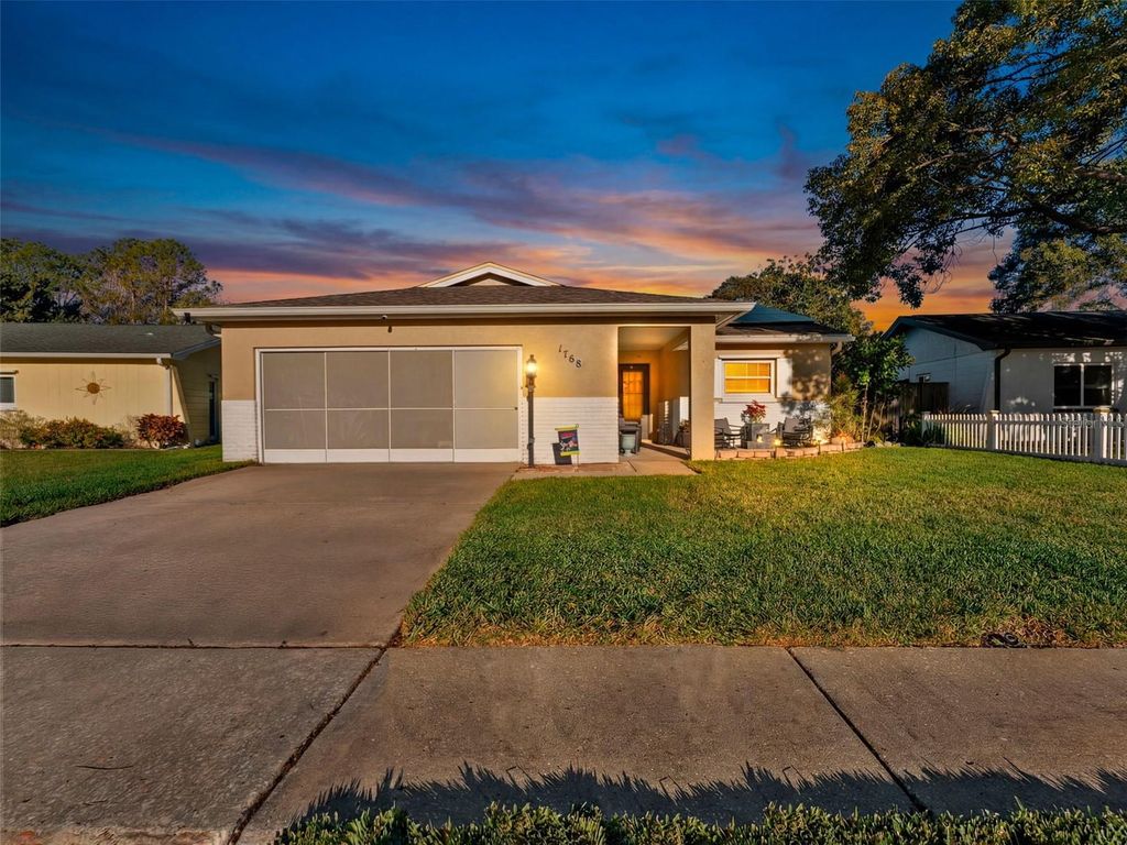 Photo of 1768 W Groveleaf Avenue, Palm Harbor, FL 34683 (MLS # TB8469393)