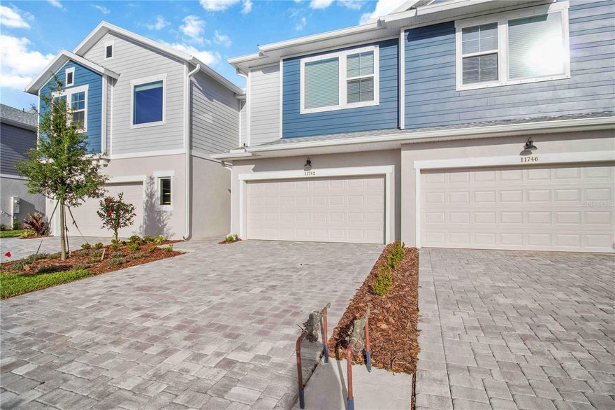 If you’ve been waiting for an opportunity to settle in North River Ranch, here it is! 
This immaculate Mabel II Townhome in Crescent Creek is less than a year old and the ONLY INTERIOR UNIT AVAILABLE! The builder will not have another building ready for 8-10 months. Ideally located just steps from the Camp Creek amenity center and close to top-rated schools, this townhome offers the perfect blend of style, comfort, and convenience. 
The pristine open concept kitchen features a generous island, stainless steel appliances, abundant cabinetry, and a seamless connection to the dining and family areas.  Plenty of natural light brightens the space from the front door to the back sliders.  A cozy screened-in patio offers a peaceful retreat where you can enjoy the outdoors in comfort and privacy. Added storage under the stairs and a two-car garage add plenty of space and functionality to the first floor.  
On the second floor, the generously sized master suite boasts a clean, modern bath and extended walk-in closet.  The other two bedrooms have the same neutral color scheme and share a third bathroom.  The laundry room is conveniently located upstairs as well.
North River Ranch offers a vibrant lifestyle with resort-style amenities including a fitness center, swimming pools, walking trails, playgrounds, and regular community events with easy access to I-75, shopping, dining, and Florida’s beautiful beaches. Don’t miss this exceptional opportunity to own a nearly new Townhome with everything you need, right now.