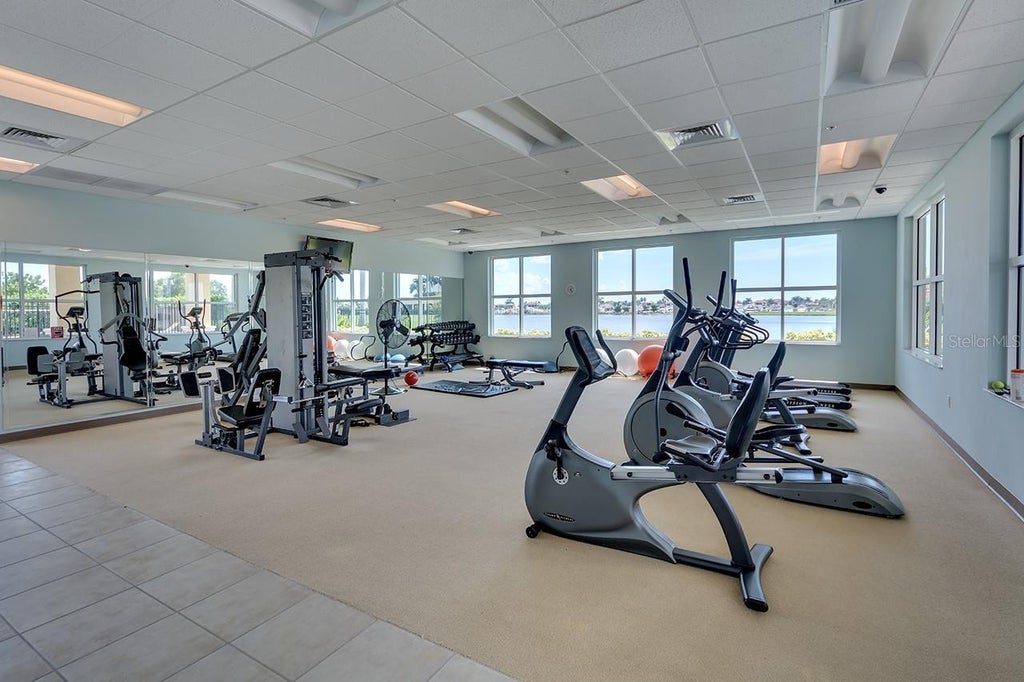 Photo of 611 Riviera Dunes Way #308, Palmetto, FL 34221 (MLS # A4705718)
