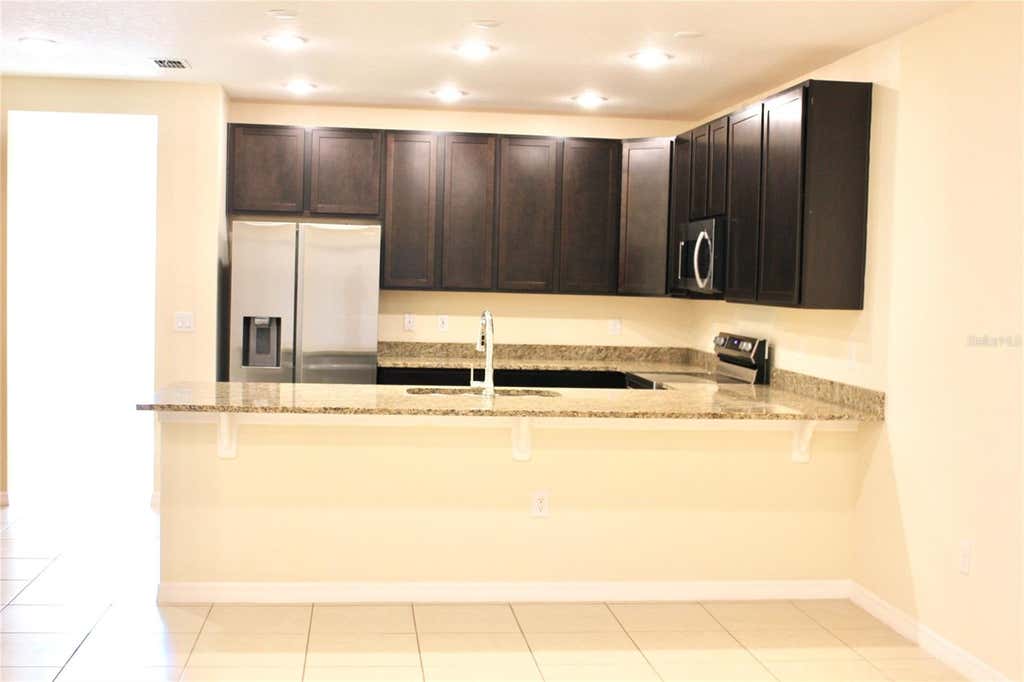 Photo of 4723 Coral Castle Drive, Kissimmee, FL 34746 (MLS # O6421889)