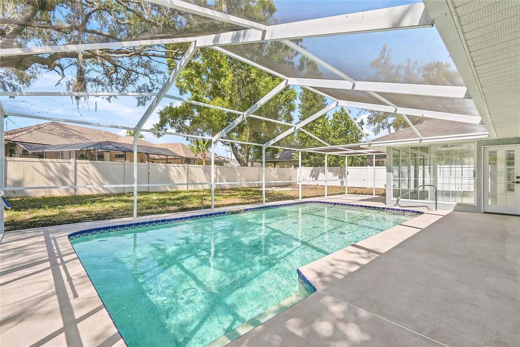 Photo of 1307 Belcher Drive, Tarpon Springs, FL 34689 (MLS # TB8521673)