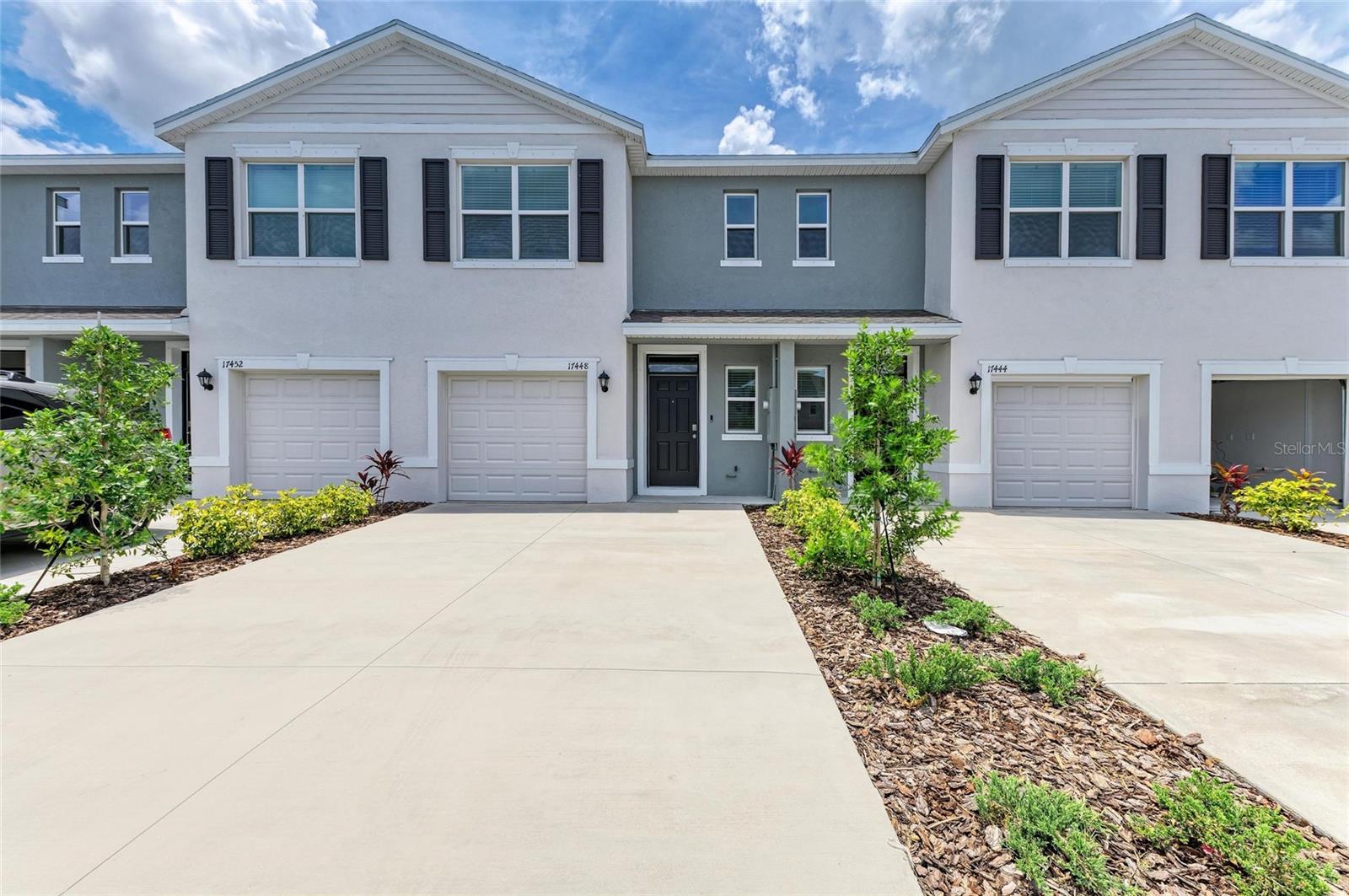 One or more photo(s) has been virtually staged. Welcome to Star Farms, a vibrant new community nestled in the heart of Lakewood Ranch!
This brand new, never lived in 3 bedroom, 2.5 bathroom townhome boasts a perfect blend of comfort, style, and convenience; with breathtaking lake views right in your backyard.
Step inside to find an open and airy living space featuring glistening quartz countertops and sleek stainless steel appliances. Upstairs, all three bedrooms have plush carpeting for a soft, cozy retreat at the end of the day. A washer and dryer are included for added convenience.
Enjoy peaceful mornings or sunset evenings on your private rear patio — with a screened lanai and backyard fence coming soon, making it perfect for relaxing or entertaining. One pet is welcome with owner approval.
Located in a top-rated school district, this home also includes an attached one-car garage and access to some of the most exciting amenities around. Star Farms features three resort-style pools and a spa, a state-of-the-art fitness center, sports fields, a pet park, playground, café, scenic greenways and trails, and even more community enhancements on the horizon.
All of this just minutes from Downtown Lakewood Ranch, the UTC Mall, SRQ Airport, and the world-famous beaches of Florida’s Gulf Coast.
Come experience lakeside living and endless amenities in one of Florida’s most sought-after communities.