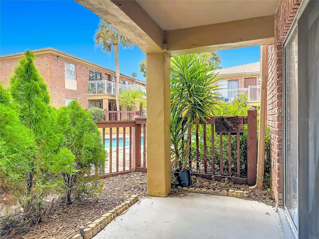 Photo of 476 Banyon Tree Circle #104, Maitland, FL 32751 (MLS # O6432801)