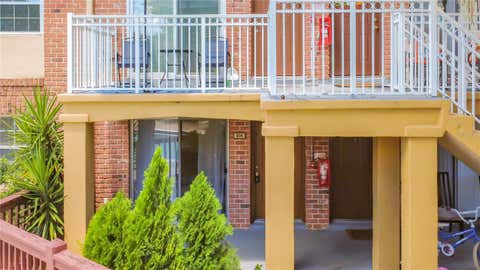 Photo of 476 Banyon Tree Circle #104, Maitland, FL 32751 (MLS # O6432801)