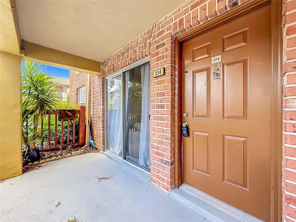 Photo of 476 Banyon Tree Circle #104, Maitland, FL 32751 (MLS # O6432801)