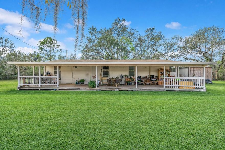 One or more photo(s) has been virtually staged. Excellent opportunity to own a spacious property with land in Haines City! This home sits on an expansive 4.92-acre lot, offering privacy, open space, and endless possibilities. Surrounded by mature trees and natural beauty, the property provides a peaceful setting while still being conveniently located near US-27, shopping, dining, and major attractions.

The home features a comfortable layout with living areas, a bright living space, and a functional kitchen with ample cabinet and counter space. The bedrooms are generously sized, and the home offers great potential for customization.

With nearly 5 acres of land, this property is perfect for those looking for space, outdoor living, gardening, storage, or future improvements. Whether you're seeking privacy, room to expand, or a quiet retreat close to city conveniences, this property offers incredible potential.