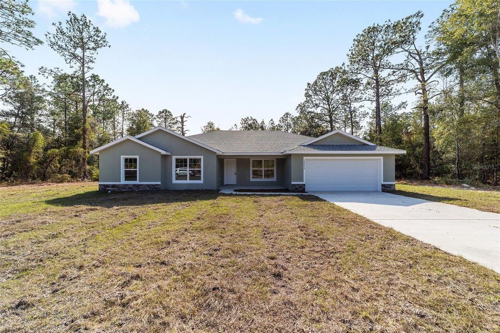 Photo of 12892 SW 80th Street, Dunnellon, FL 34432 (MLS # OM714472)