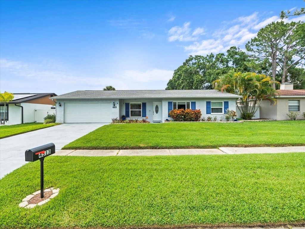 Photo of 4313 Hollow Hill Drive, Tampa, FL 33624 (MLS # TB8404876)