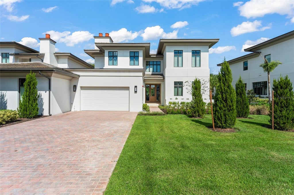 Photo of 4139 Grande Brick Loop #15, Orlando, FL 32837 (MLS # O6450558)