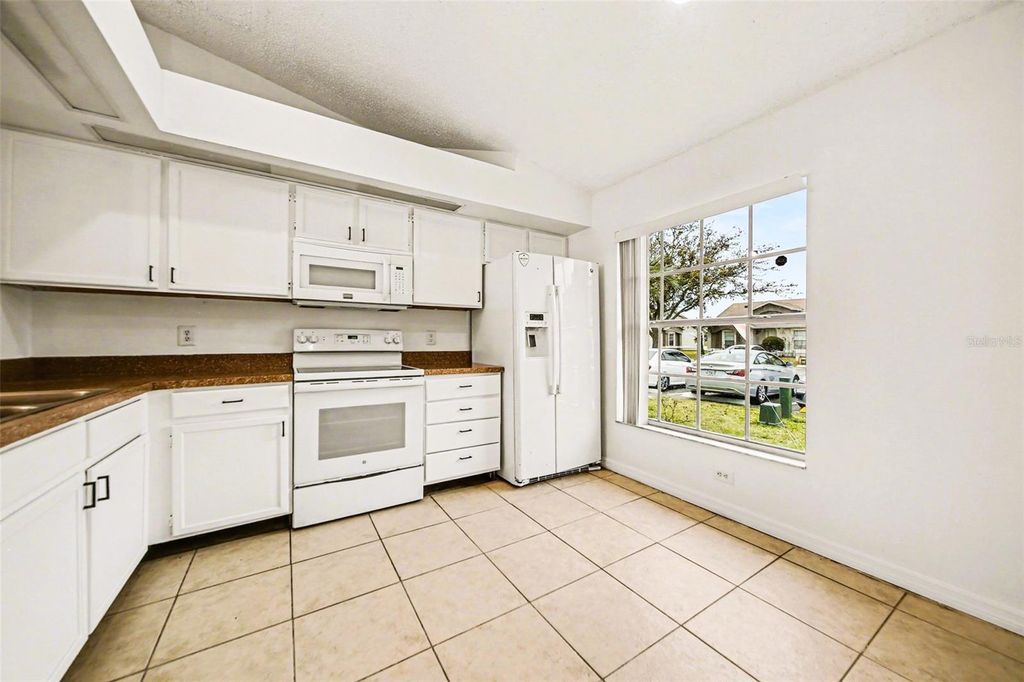 Photo of 14657 Laguna Beach Circle, Orlando, FL 32824 (MLS # O6393037)