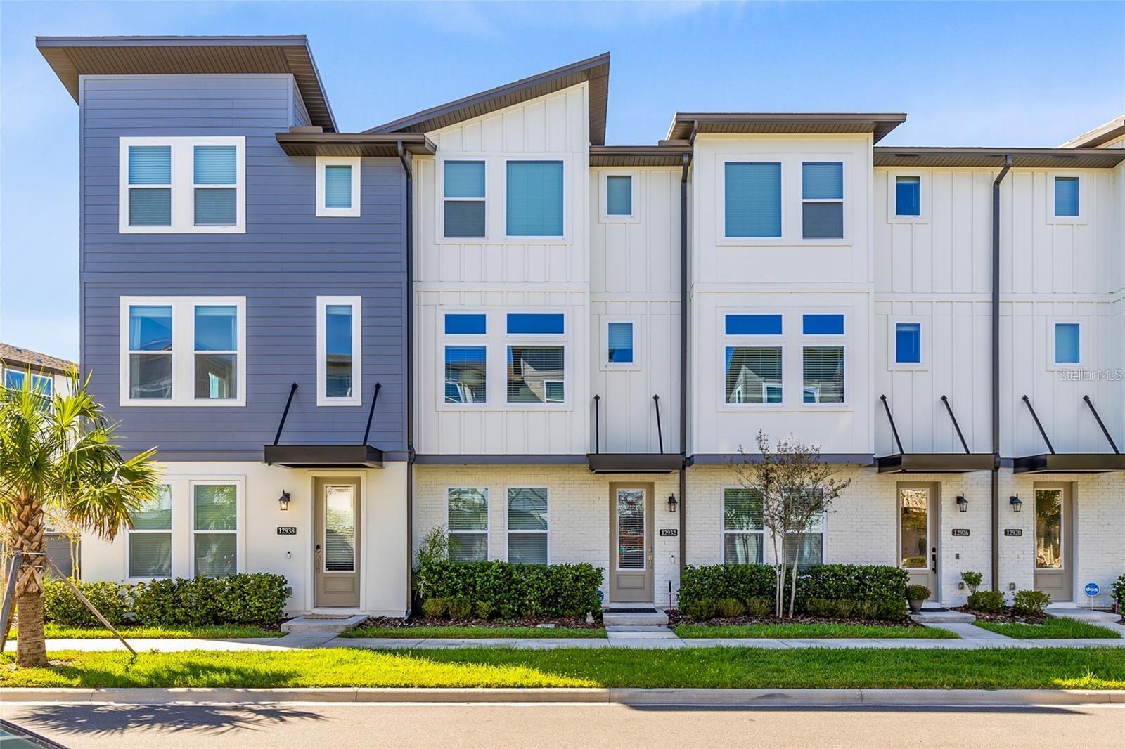 Like New Luxury Townhouse available now in sought after Laureate Park! Three levels with a two car garage, guest bedroom/ office on the first floor along with a full bathroom. Luxury vinyl throughout the second floor which includes a large living room and dining room along with a gourmet kitchen. Extra large island is perfect for cooking and entertaining. Stainless steel appliances and quartz countertops finish the kitchen off. Door to your private balcony off the kitchen and dining makes for the perfect place to enjoy your morning coffee. Lots of natural light through out the interior. Upstairs you will find a large master suite with walk in closet, dual sinks and large shower along with bedroom three and a private full bathroom. Excellent location with easy access to 417, 528, medical city and Orlando international airport and just down the street from Boxi Park. Laureate Park features resort like amenities with two community pools, beach volleyball, fitness center, community parks, playgrounds, dog parks and plenty of walking trails. Schedule your Tour TODAY!!!!
