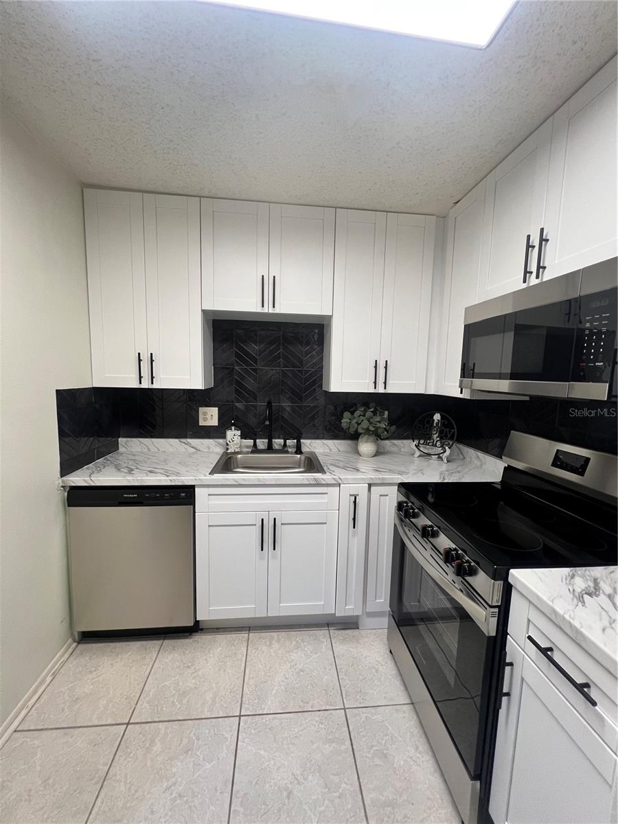 RAINTREE VILLAGE CONDO N - Residential