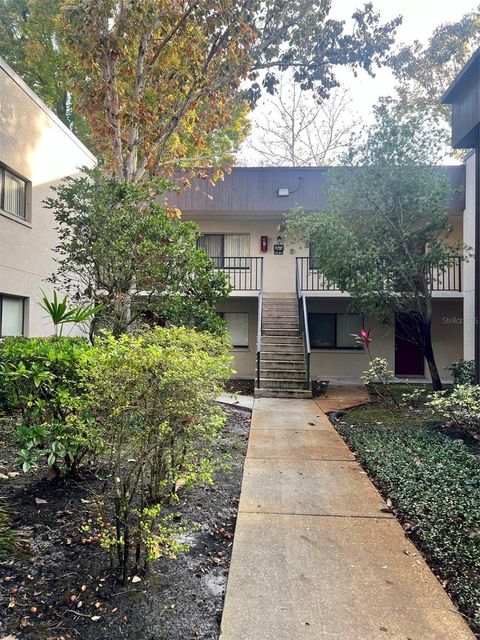 Photo of 11707 Raintree Village Boulevard #C, Temple Terrace, FL 33617 (MLS # TB8452398)