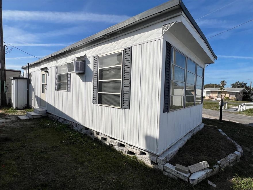 If you’re seeking an inviting 55-plus community, this new listing of a one-bedroom, one-bath home in Midway AM/CAN might be perfect for you! Located in a friendly neighborhood with amenities to enhance your lifestyle, it features a community clubhouse just steps away, where residents meet for social events, activities, and to enjoy the well-kept shuffleboard courts. Additionally, the community provides a pay-by-use laundry facility equipped with washers and dryers, complemented by an outdoor drying yard.  The home sits on a corner lot surrounded by open space, giving it a bright, airy feel—ideal as a winter getaway! The low maintenance fee of $192.00 per month covers water, sewer, trash, and lawn care. You’ll be close to Tampa Bay, Gulf beaches, restaurants, and shopping, and the park allows up to two cats. This home combines contentment and community in one attractive package!
INTERIOR:
Full of promise, this home presents a kitchen outfitted with all essential appliances, a petite eating area, and impressive storage options—including two built-in cupboards with glass doors that are perfect for displaying cherished items. The inviting living space is ideal for movie nights or entertaining guests, while a heating and air conditioning unit keeps things cozy. There's also a practical sleeper sofa in the living room-perfect for hosting last-minute guests. The bathroom includes a practical tub-and-shower combo. In the bright, airy bedroom, a mini-split system ensures year-round solace, and abundant storage is provided by two closets and built-in drawers. Featuring laminate floors throughout, attractive wall panels, and a ceiling fan, this home offers a great foundation with plenty of potential for upgrades and personal touches!
EXTERIOR:
This home features durable aluminum siding paired with a metal roof for added protection and longevity. An outdoor shed provides the perfect solution for extra storage, while ample space allows room for two vehicles to park with ease. Priced at a tremendous $29,900, with a share included, this property is enjoyable as is, with the freedom to make it uniquely yours. Call to schedule your private showing!