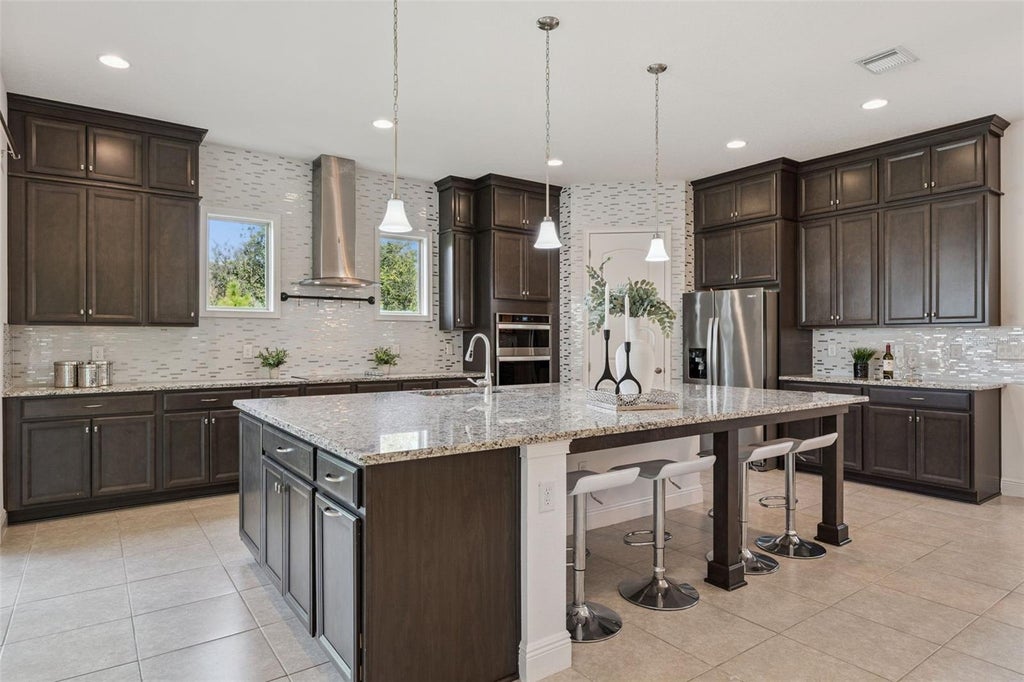 Photo of 13169 Bromborough Drive, Orlando, FL 32832 (MLS # O6448154)