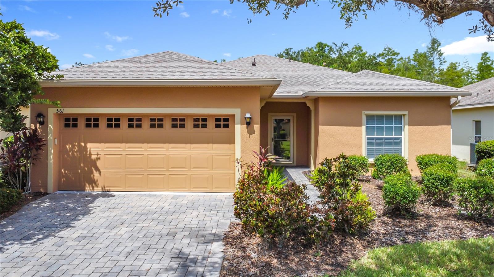 One or more photo(s) has been virtually staged. LOCATION, LOCATION, LOCATION… This 2 Bedroom/2 Bath Concerto Model Home with a Den is located on a beautiful Conservation Lot. RECENT UPDATES include a NEWER ROOF 2023, NEWER A/C 2015 & NEWER H/W HEATER 2024. The PLANTATION SHUTTERS throughout the home, not only look stylish but also help to keep your ELECTRIC BILLS LOW. This OPEN CONCEPT Great Room/Dining Room combo features BEAUTIFUL PERGO WOOD LAMINATE floors throughout the living areas and ceramic tile in the wet areas. The Kitchen features a bright and airy space with a breakfast bar for seating, a FRENCH DOOR REFRIGERATOR, a REVERSE OSMOSIS WATER FILTRATION SYSTEM and a closet pantry. The Owner’s Suite features a WALK-IN CALIFORNIA CUSTOM CLOSET, attached en-suite bath with LARGE WALK-IN SHOWER, and separate Water Closet. The second bathroom is centrally located between the second bedroom and den for ease & convenience. The ALL-SEASON ROOM offers a quiet space or can serve as an entertainment space to enjoy the conservation views. A separate laundry room & two-car garage are adjacent to the kitchen for easy access in any weather. This home has it all at a price that can’t be beaten! **Solivita is an active adult 55+ community located in Kissimmee, Florida. It is approximately 50 minutes from Disney World & the Orlando International Airport. Solivita has a total of 5,470 homes. Approximately 10,000 - 11,000 people live in Solivita during the winter while approximately 7,500 live in Solivita during the summer. Enjoy your active years in this piece of paradise. Solivita's amenities include: - a manicured SOFTBALL diamond & field - 36 holes of CHAMPIONSHIP GOLF that can be played by joining the Stonegate Golf Club or paying as you go - 2 STATE of the Art AMENITY centers with updated exercise equipment, yoga studio & meeting rooms - 3 restaurants - 14 HEATED POOLS - 17 PICKLEBALL courts - 9 TENNIS courts - 4 BOCCE BALL courts - 4 SHUFFLEBOARD courts - 3 HORSESHOE pits - a BILLIARDS room - miles of bike paths - 2 DOG PARKS (Small & Large Dogs) - Corn Hole - Tot Lot PLAYGROUND - COMMUNITY GARDEN - over 250 resident clubs. The HOA: - maintains the LANDSCAPING & IRRIGATION systems in the common areas as well as at individual homesites - maintains the roads throughout the community - PROVIDES SECURITY with gate guards and mobile patrols including the Polk County Sheriff - allows AUTOMATED GATE ACCESS for residents via license plate readers - provides residents with Fiber Optic Internet & TV service.***Poinciana Lakes Plaza is a MAJOR NEW SHOPPING CENTER that opened directly across from the Solivita Main Gate in Summer of 2024. It features Sprouts Grocery, TJ MAXX, Ross, Burlington, Rack Room Shoes, 5 Below, Ulta, Outback, First Watch, 5 Guys, Urgent Care, Dentist, TD Bank, Petco & Hair Cuttery PLUS MORE TO COME.***