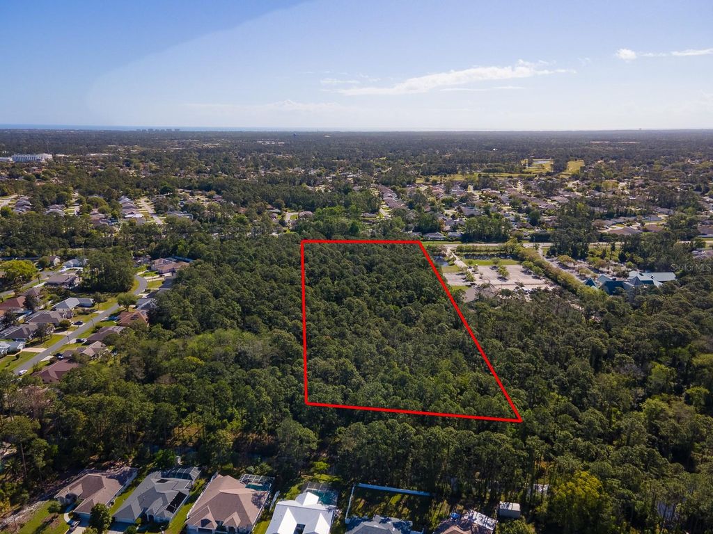 Photo of Xxxx Pine Lakes Parkway, Palm Coast, FL 32164 (MLS # FC318643)