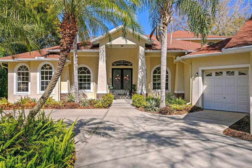 RARE opportunity to own a home in one of Tampa Bay’s most desirable locations, the Keystone neighborhood of Odessa, priced below appraised value. This well-maintained pool home is situated on an almost full-acre lot on a quiet cul-de-sac street, offering exceptional privacy surrounded by mature trees and a peaceful, natural setting.

Upon entering the home, you are welcomed into a formal living room and dining room that overlook the pool and backyard, creating an immediate sense of space and an effortless indoor-outdoor connection - ideal for entertaining or relaxed everyday living. A private home office at the front of the home provides a dedicated and quiet workspace, while two spacious bedrooms offer comfortable accommodations for family or guests. A generously sized fourth bedroom adds flexibility for a home theater, media room, or private guest suite. New interior doors throughout enhance the home’s updated and well-cared-for feel. Completing the main level, the renovated kitchen is a true chef’s delight, featuring quartz countertops, an elegant backsplash, generous workspace, kitchen island with cooktop, an eat in area and a layout that opens to a large family room, creating the perfect gathering space for everyday living, entertaining, and making lasting memories with family and friends.

Upstairs, the spacious primary suite offers a private retreat with abundant room to unwind. The suite features large walk-in closets, a luxurious bathroom with a separate walk-in shower and soaking tub, dual sink areas, and a cozy sitting area - perfect for reading or enjoying a quiet morning. Step out onto the private balcony overlooking the pool and lush trees, creating a serene setting to relax and take in the tranquil surroundings. Take the spiral staircase from the balcony down to pool and spa area, perfect for convenience and privacy.

Step outside to enjoy Florida living at its best with a screen-enclosed pool and spa, perfect for relaxing evenings, weekend entertaining, or quiet mornings surrounded by nature. The home is equipped with hurricane impact glass throughout and includes a Polaris P5500 generator, offering added peace of mind and comfort year-round.

Located in one of Odessa’s most sought-after communities, this property offers a rare combination of space, privacy, and value. The home is  conveniently located close to top-rated schools (Steinbrenner), shopping, dining, major highways, golf courses, award winning beaches, nature trails, miles of bike trails, beautiful parks and reserves, while having easy access to Tampa, Pinellas and Pasco counties. Don't miss the opportunity to make this exceptional Odessa home your own!