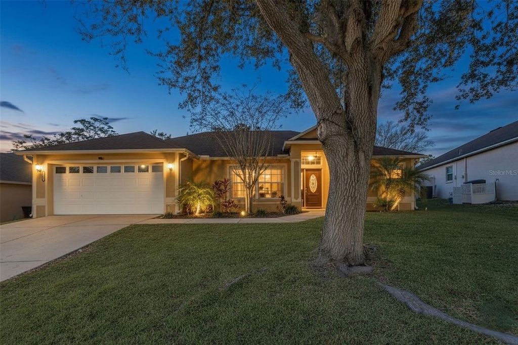Photo of 129 Compass Rose Dr Brook, Groveland, FL 34736 (MLS # O6410917)