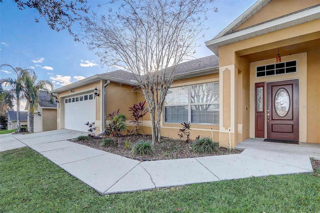 Photo of 129 Compass Rose Dr Brook, Groveland, FL 34736 (MLS # O6410917)