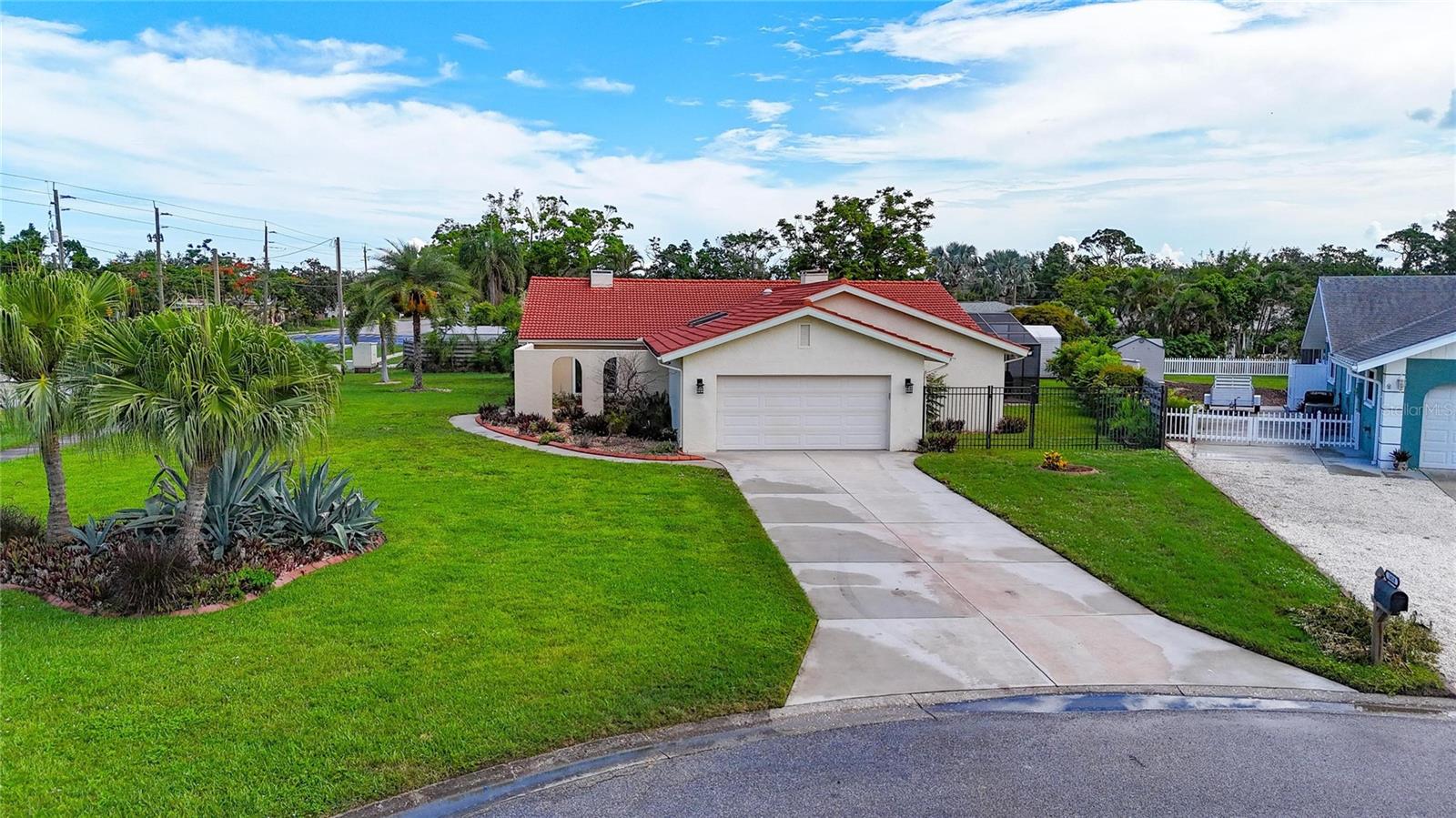 ASSUMABLE VA LOAN AT 3.5% + NO HOA, NO CDD, NO DEED RESTRICTIONS Hot Property! This custom-built 4-BEDROOM, 2.5-BATH beauty sits on OVER 1/3 ACRE in a quiet cul-de-sac in highly sought-after Northwest Bradenton—just minutes from the world famous beaches of ANNA MARIA ISLAND, ROBINSON PRESERVE, and DESOTO NATIONAL MEMORIAL!
Step inside to a BRIGHT ATRIUM GREAT ROOM with SOARING WOOD BEAM CEILINGS, SKYLIGHTS, and WALLS OF IMPACT-RATED WINDOWS AND DOORS that flood the home with natural light. Whether you're entertaining, hosting family gatherings, or setting up a personal fitness zone—this layout has the space and flexibility to match your lifestyle.
The kitchen delivers with TONS OF COUNTER SPACE, MODERN APPLIANCES, and STORAGE GALORE—plus a CENTER ISLAND for meal prep or casual dining. Adjacent dining and family rooms share a DOUBLE-SIDED FIREPLACE. Custom tile and LAMINATE FLOORING flow throughout the home, with TWO AC UNITS and TWO WATER HEATERS to keep things running comfortably. The barrel tile roof was installed in 2016 and has tons of life left.
The MASTER BEDROOM features a MASSIVE WALK-IN CLOSET with BUILT-INS and a private en-suite with a SOAKING TUB and separate walk-in shower. Three additional bedrooms offer flexibility for home offices, guest rooms, or hobby spaces. Owner used one of the room as a full library.
You'll love that the yard is FULLY FENCED and has plenty of ROOM FOR A POOL if you want to add one.
Located in the heart of Northwest Bradenton, you're just minutes - MINUTES - to PALMA SOLA BAY, GULF BEACHES, ANNA MARIA ISLAND, top-rated schools, public and private GOLF COURSES, dining, shopping, parks, and more. LOCATION LOCATION LOCATION, No HOA restrictions, and a RARE ASSUMABLE VA LOAN make this a truly special opportunity.
This one checks all the boxes—schedule your showing today!