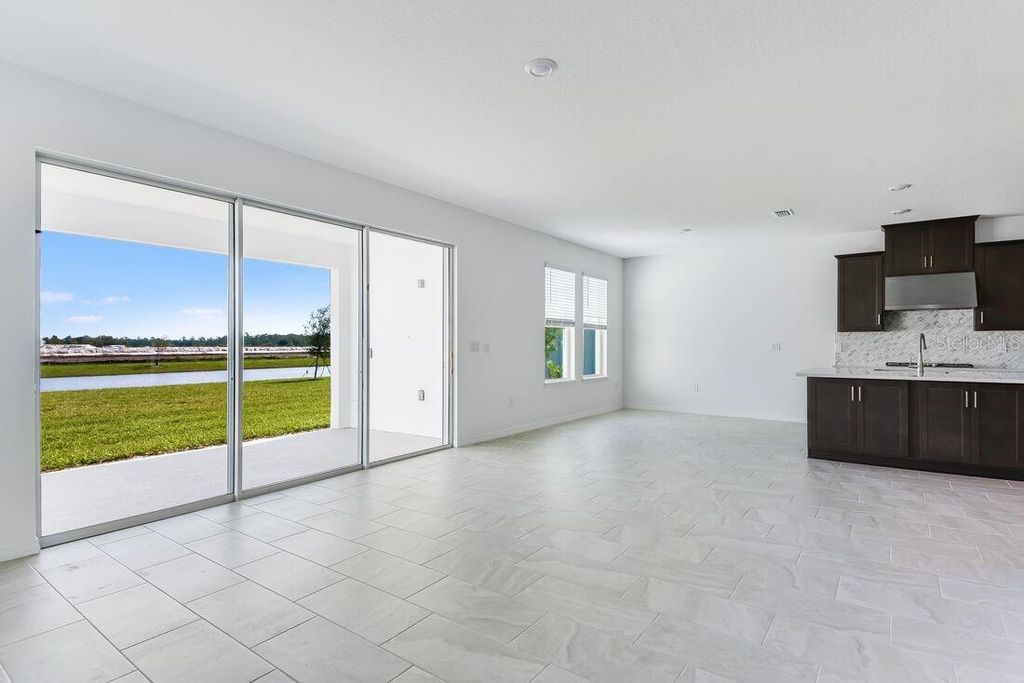 Photo of 849 Junonia Boulevard, New Smyrna Beach, FL 32168 (MLS # O6346611)