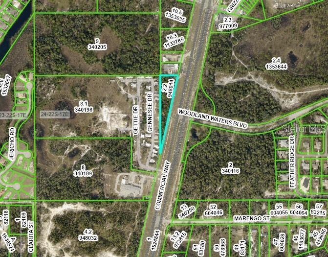Commercial Potential 1.79 Acres MOL located between The Heather and Glen Lakes across the highway from Woodland Waters. Currently zoned AG. Prime location to service three (3) communities.
