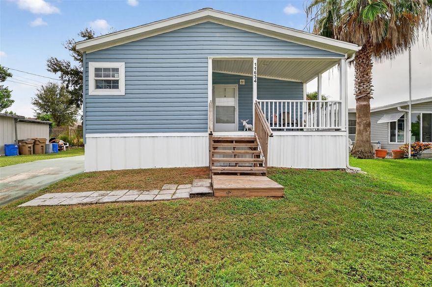 Built in 2023, this charming 2-bedroom, 2-bath home offers modern comfort in the desirable 55+ Imperial Terrace community, perfectly situated on the Dead River providing direct access to the Harris Chain of Lakes. Enjoy relaxing on the covered front porch before stepping inside to an open-concept living area that flows into the kitchen, complete with a spacious island that’s ideal for entertaining. The primary suite features two closets for added convenience. Imperial Terrace offers a vibrant, active lifestyle with a boat launch, pavilion with BBQ area, cornhole and horseshoes, a walking bridge, indoor pool and hot tub, and a clubhouse with a library, billiard room, and kitchen for social gatherings and community events. Boat trailer storage and dock rentals are available for just $25 a month each. Conveniently located near shopping, dining, and medical facilities. This home combines comfort, community, and the best of Florida living.