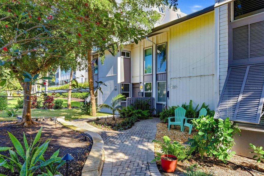 Private end-unit residence at Peppertree Bay with outdoor patio space, lush tropical landscaping, and an easy stroll to the bayside community pool from the back door. Inside, you’ll find extensive renovations and updates throughout, including new flooring, doors, fans and fixtures, walls, baseboards, and cabinetry. Major system improvements have also been completed, including waste lines, A/C, appliances and washer, dryer. Both the primary and guest baths have been updated along with a major enhancement to the kitchen.  The 1st and 2nd floor lanai windows have been recently replaced—bringing in light while providing enhancing comfort and extended living space. A rare combination of privacy, thoughtful upgrades, and that classic Peppertree Bay lifestyle on Siesta Key. Must see and easy to show.