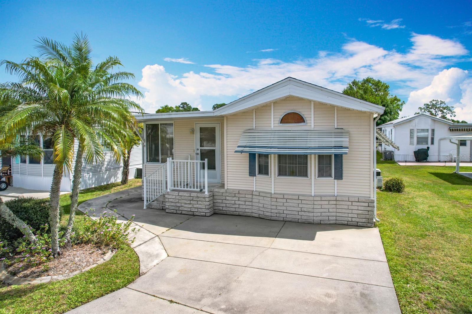 **For Sale: Charming Furnished Single Wide Home in a Vibrant 55+ Community** Welcome to this delightful single wide park model home, perfectly nestled in a serene 55+ community in Central Florida. This inviting property features a spacious one bedroom and one bath, making it an ideal retreat for those seeking a wonderful seasonal escape or a permanent residence. As you step inside, you'll appreciate the thoughtful layout that maximizes space and comfort. The home comes furnished, allowing you to settle in effortlessly and start enjoying your new lifestyle immediately. The cozy park model sits on a secure cement pad, providing stability and easy access, unlike homes elevated off the ground. One of the standout features of this property is the beautifully built-on Florida room, where you can bask in the warmth of countless sunshiny days. This versatile space is perfect for morning coffee, afternoon relaxation, or entertaining friends and family. Additionally, a convenient storage shed is located in the backyard, providing extra space for the essentials. Embrace the active lifestyle this thriving community. Engage in an array of amenities including an inviting swimming pool, well-maintained golf course, and exciting shuffleboard and pickleball courts. For tennis enthusiasts, courts are readily available to challenge friends or hone your skills. The community center serves as the hub of engagement, offering a wealth of activities and events that let you choose how you want to connect with your neighbors. With a dedicated POA office to assist residents, you can navigate community living with ease. Rest assured knowing this home is equipped with underground utilities and is not located in a flood zone, providing peace of mind for both residents and prospective buyers. Don't miss your opportunity to own this exceptional property in a community that celebrates an active and fulfilling lifestyle. Schedule your private showing today and step into the perfect blend of comfort and convenience in the heart of Central Florida!