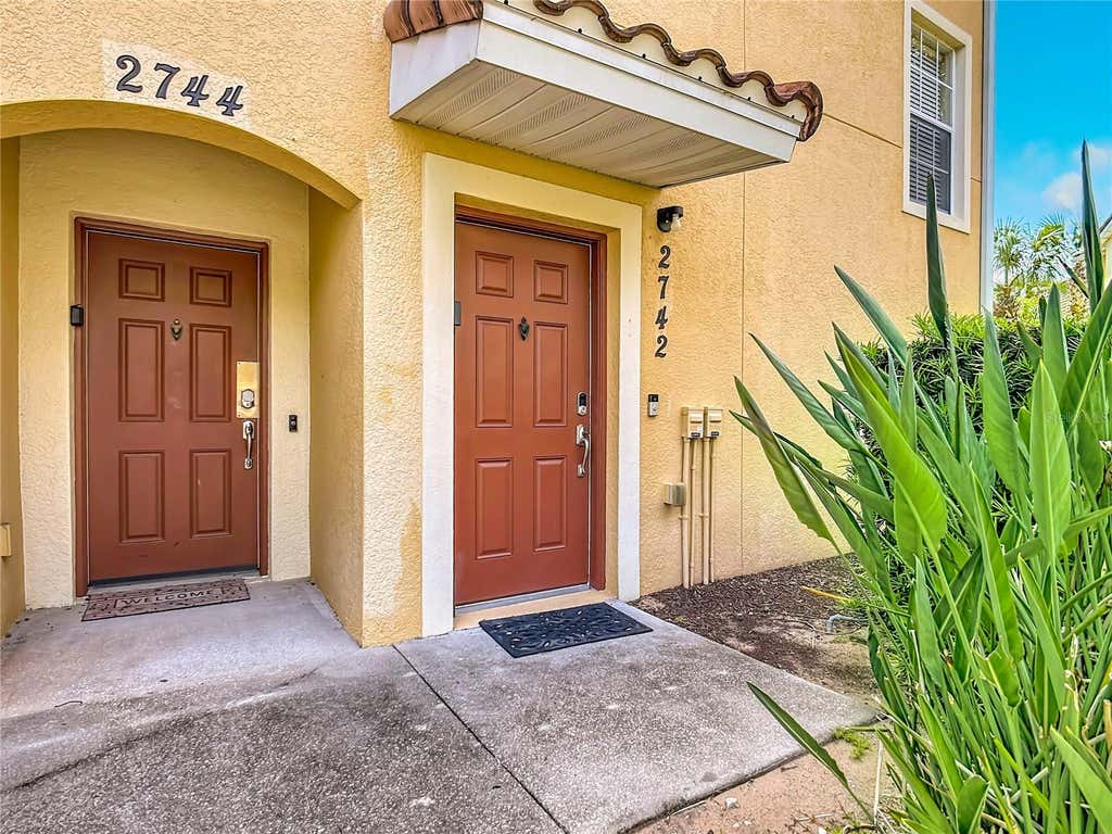 Photo of 2742 Oakwater Drive #104, Kissimmee, FL 34747 (MLS # O6432444)